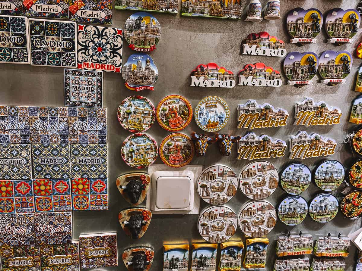 rows of tourist looking magnets on a wall