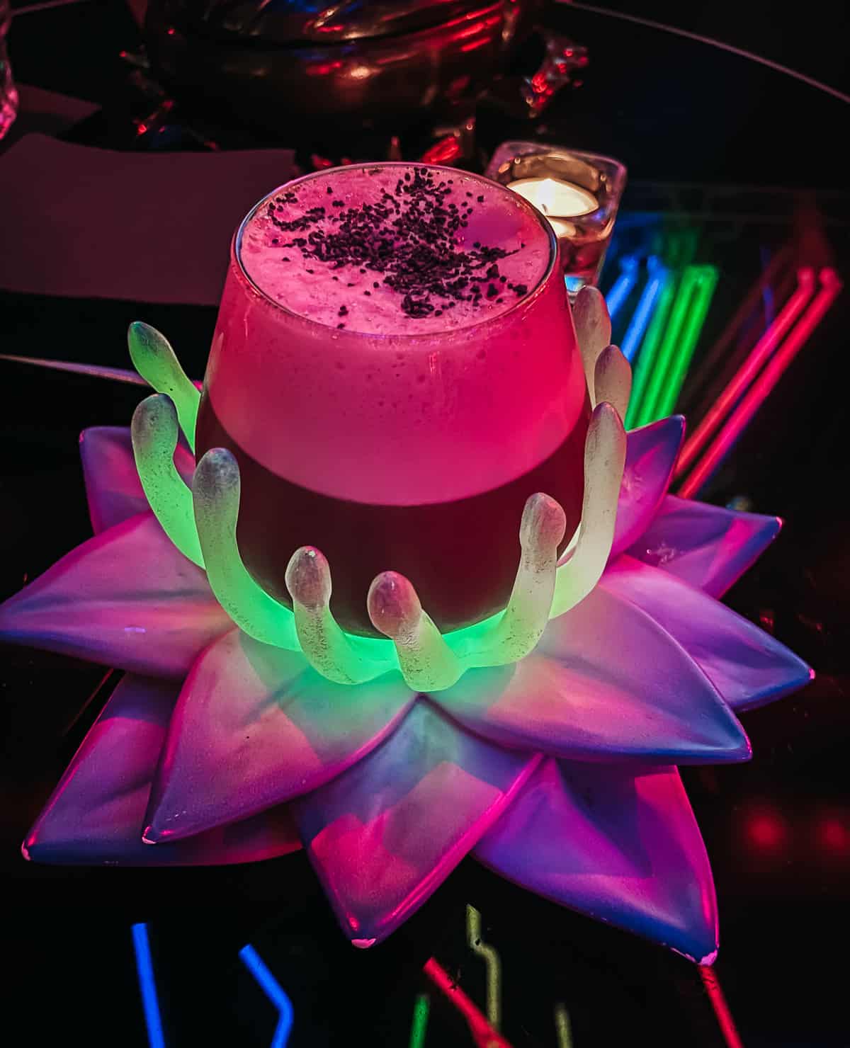 a craft cocktail in the shape of a flower at Salmon Guru in Madrid