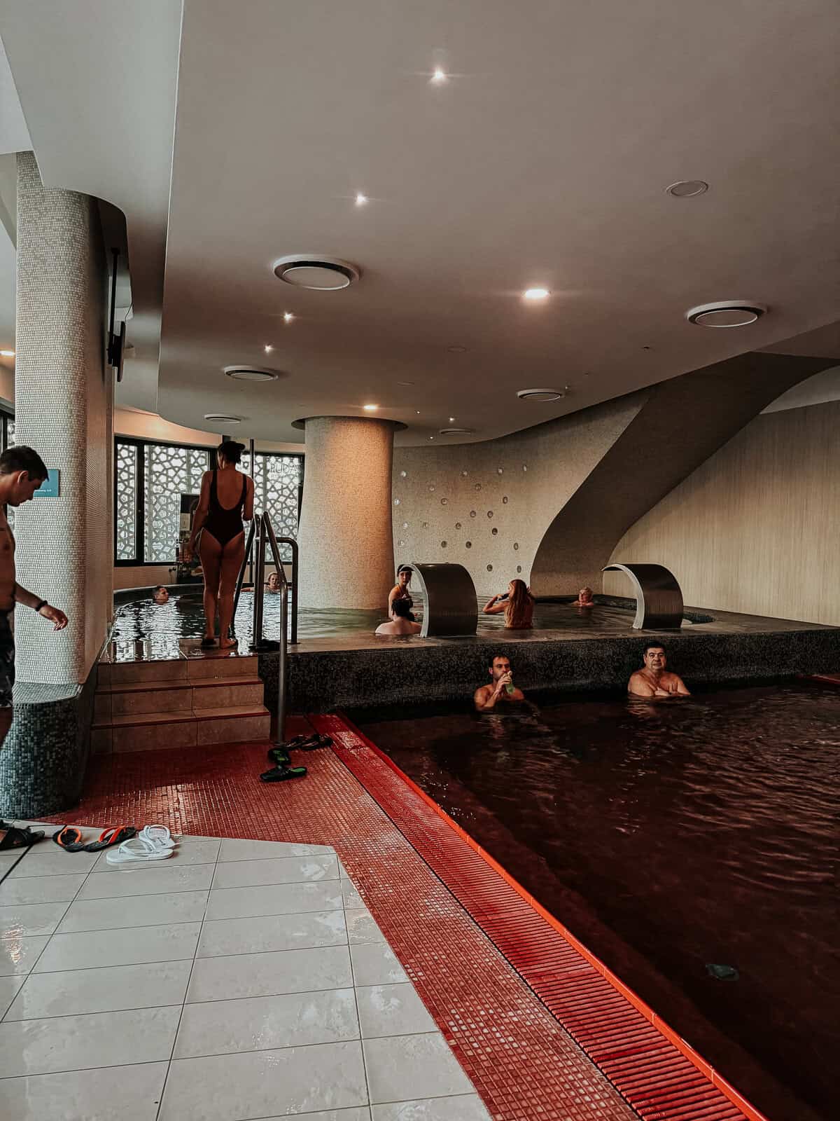 Image showing people relaxing in an indoor thermal pool area at Rudas Gyógyfürdő (Rudas Baths), Budapest.